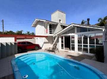 704135_iRky8_70413567fc435a19da9.jpg · Casa com 3 quartos (1 suíte), piscina e terreno de 360m² a apenas 300 metros da charmosa Praia da Da