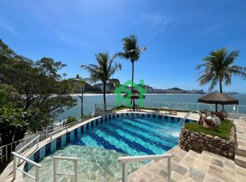 Piscina · Apartamento à venda na Praia das Astúrias I Rocha Imóveis Guarujá