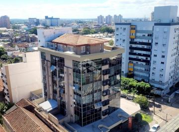 6d464e77-ca8d-4753-93ab-33da5810014e · Sala comercial e vista para o Guaíba