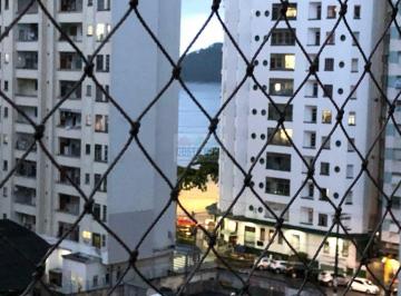 Apartamento · 85m² · 2 Quartos · 1 Vaga · Apartamento com 85m², 2 quartos, 2 banheiros, 1 vaga, sacada e pequena vista Mar