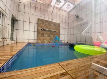 aba45fe29a0a4fb7f410ec365791d6ad754ae6ce · Casa com 3 dormitórios à venda, 150 m² por R$ 950.000,00 - Mirim - Praia Grande/SP