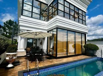 Casa · 343m² · 4 Quartos · 4 Vagas · Casa de luxo com 4 suítes, elevador e espaço gourmet em condomínio fechado em Balneário Camboriú/SC