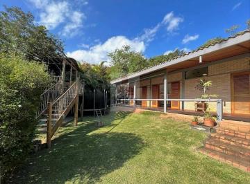 Casa · 383m² · 5 Quartos · 4 Vagas · Encante-se com Esta Linda Casa Térrea e Contemporânea em Meio à Natureza!