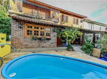 Casa · 200m² · 4 Quartos · 2 Vagas · Casa de condomínio à venda em Porto Alegre, Santa Tereza, com 4 quartos, 200m²