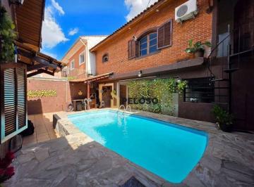 d7e8071cc0eefc6d00d5b0e3b20aed3450dcb3da · Casa térrea com piscina à venda | 240m² | 2 dormitórios | Edícula | 4 vagas | Jardim do Colégio (Zon