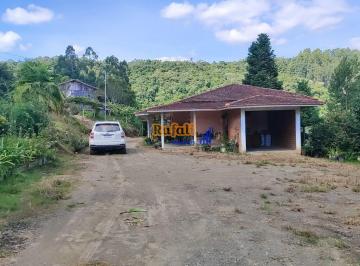 ih9wzme2oda5ndlkm2myzgzh_md · Sitio em Alfredo Wagner, terra de trator, pomar, casa grande, 2 galpão pastagem.