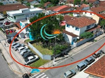 Foto 01 · Prédio de esquina com dois andares disponíveis para reforma, e um terreno com capacidade para até 14
