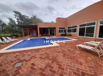 2c71c894f7374cc4f412a15f5df822bc6f94aca3 · Casa estilo toscana, com 7 suítes,