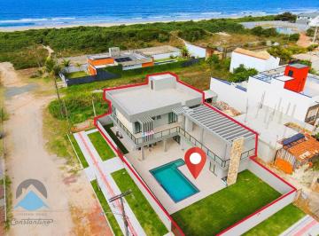 Sobrado · Casa de Alto Padrão à Venda no Coroados Guaratuba-PR: 6 quartos sendo 5 suítes, Vista mar, 350 m² de