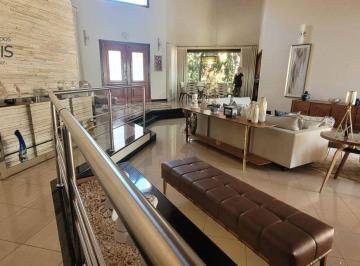 9e76851f230267137d9bc9711f80742acb4e2978 · Casa com 3 dormitórios à venda, 522 m² por R$ 1.950.000 - Condomínio Okinawa - Paulínia/SP