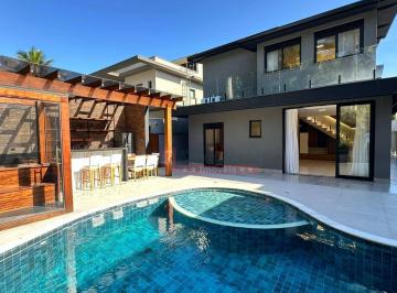 c853df7461687e64ca751764516ecc989c82b500 · Casa com 6 dormitórios à venda, 380 m² por R$ 6.500.000,00 - Riviera Módulo 21 - Bertioga/SP