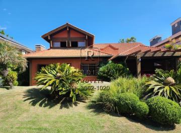 Foto 01 · Luxuosa casa em condomínio para venda ou locação em Belém Novo, Porto Alegre-RS: 4 quartos, 4 suítes