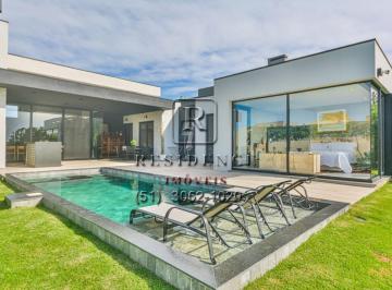 Foto 31 · Luxuosa casa em condomínio à venda em Belém Novo, Porto Alegre-RS: 4 quartos, 4 suítes, áreas amplas