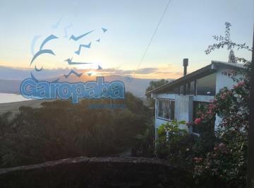 Foto 01 · Casa em Condomínio à Venda na Ferrugem, Garopaba-SC: Seu Refúgio com Vista para a Lagoa!Seu novo ref