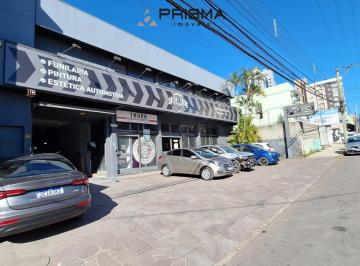 Comercial · 180m² · 1 Quarto · Sala comercial com copa, sacada e depósito no bairro Medianeira em Santa Maria