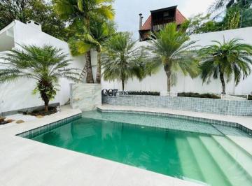 Casa · 330m² · 4 Quartos · 5 Vagas · Casa a venda com 330m² de área construída.