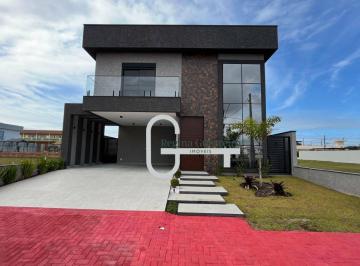 efa67168d4b86d5d74920f03b7a6c4b3cf29d771 · Casa com 4 dormitórios à venda, 262 m² por R$ 2.000.000,00 - Condomínio Flora Rica - Peruíbe/SP
