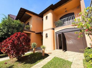 694103_iR356_694103681a5a6e74937.jpg · Casa com 2 dormitórios, sendo duas suítes, vaga coberta para 3 veiculos, terreno com 1.550m², no bai