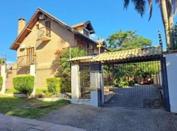 Casa · 268m² · 4 Quartos · 2 Vagas · Casa em condomínio em Ipanema de 3 dormitórios e 2 vagas