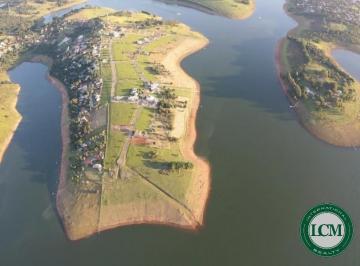 Foto 01 · Terreno à venda no Condomínio Porto Laranjeiras