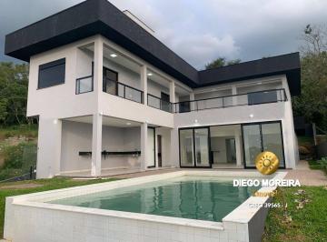 Casa · 309m² · 4 Quartos · 4 Vagas · Casa Exclusiva à venda em Loteamento com Vista Deslumbrante!