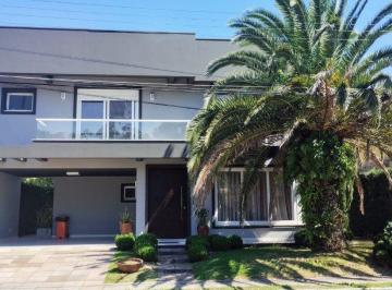 Casa · 248m² · 4 Quartos · 2 Vagas · Casa de Condomínio em Atlântida Sul