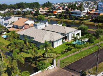 Casa · 471m² · 4 Quartos · 3 Vagas · Casa em Condomínio fechado de Atlântida