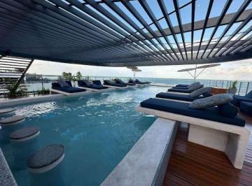c4f6065049105e1cba6e5963e2a1a8f75c3f22f0 · Flat Garden Pé na Areia de 21m2 e com Área Externa