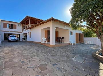 705669_ihX355hE_705669682ce2ea68b6e.jpg · Casa com 4 quartos no bairro Vila Nova, em Porto Alegre