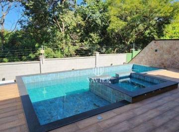 a7277f95f8aaa6bce323481a0ebfcc231c9b54db · Casa Térrea com Vista para a Mata – 4 Suítes e Piscina!