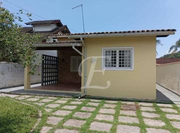 frente da casa com garagem · Casa com 3 dormitórios à venda, 104 m² por R$ 600.000,00 - Massaguaçu - Caraguatatuba/SP