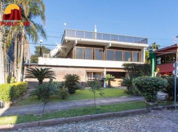 Casa · 375m² · 3 Quartos · 4 Vagas · Casa em condomínio que possui 3 dormitórios, sendo 1suíte, lavabo, escritório,