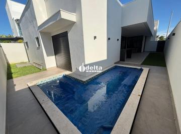 Photo 1 · Casa no condomínio Jardim Versailles disponível para venda em Uberlândia-MG