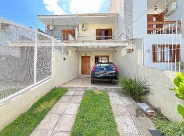 Casa · 109m² · 2 Quartos · 2 Vagas · Casa em Porto Alegre, no bairro Guarujá, com 2 dormitório(s), e 2 banheiros, à venda.