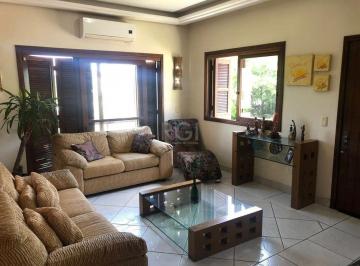 Photo 1 · Casa em Condomínio à venda 4 quartos em Cavalhada