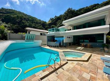 69a7c2f5a1f4dd4897770be75493bf909f239bf5 · Casa à venda em Condomínio Costão do Pernambuco no Guarujá | Omega Imóveis