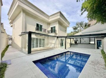 Casa · 468m² · 4 Quartos · 4 Vagas · CASA NECLÁSSICA IMPECÁVEL NO CONDOMÍNIO SÃO PAULO II – 4 SUÍTES COMPLETAS E INTEGRADAS!