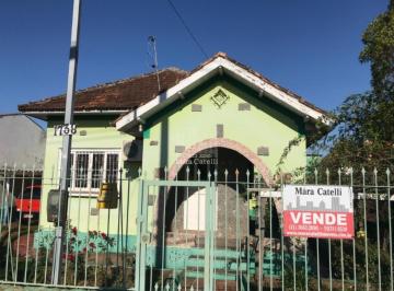 Foto 01 · Casa antiga em localização residencial ou comercial