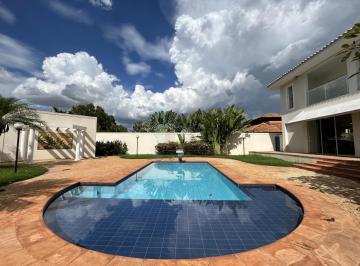 Casa · 1070m² · 5 Quartos · 4 Vagas · Casa sobrado de 562m² com 04 suítes para locação e venda em condomínio - Guaporé
