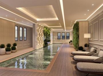 Piscina aquecida com raia de 20 metros · Apartamento de frente para o mar no Edifício Celine em Itapema