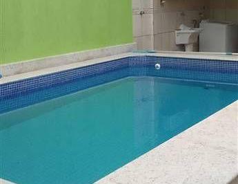 jazzsu2n2zmzmi4mtcyyjhm_md · Casa com piscina a venda na Guilhermina - 3 dormitórios.