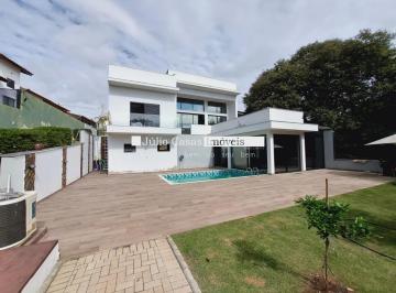 Fachada · Casa a venda no condomínio Village Ipanema com 3 suítes
