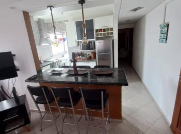 Sala integrada com cozinha · Lindo apartamento 1 dormitório próximo a praia em Santos, Porteira fechada