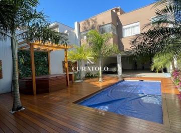 Casa · 450m² · 4 Quartos · 10 Vagas · Viva com conforto e espaço: Conheça sua nova casa de altíssimo padrão, de 4 Suítes, com 10 Vagas cob