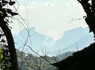 5bbbf397820f7eff49b38d0bf51e46671aa37933 · Excelente àrea com 1800 m²no Pé da Serra da TIRIRICA com vista p o Rio de Janeiro