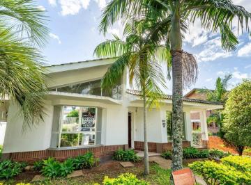 509858_iXA6o_509858660436f3c76d5.jpg · Casa no Condomínio Cantegril, Viamão, com 4 dormitórios, 5 banheiros, 3 vagas de garagem e área priv