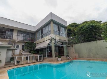 129592_i609h84uz19ft8pH3709_1295925f6cf30635e59.jpg · Esplêndida casa/sobrado com 650 m² de área construída.