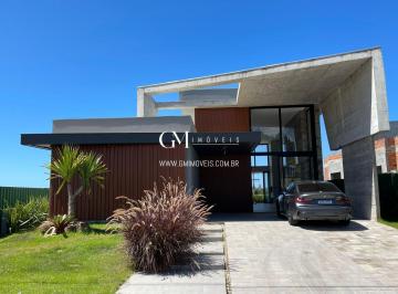 Casa · 245m² · 4 Quartos · 2 Vagas · Casa com 04 suítes no Reserva das Águas em Torres RS