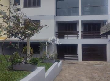 496630_iw2uk7586782z8232oFd_49663065a567b5ef5e1.jpg · Prédio residencial com 414 m2 (3 apartamentos) no Bairro De Lazzer Caxias do Sul
