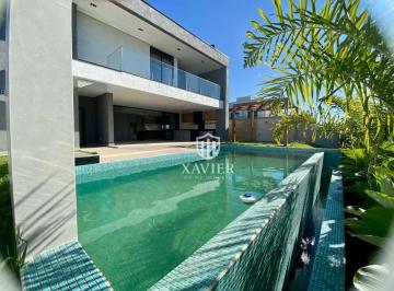 07d4ffe34fe271f7f8f7fb83fdbe32594a42e489 · Casa Alto Padrão à Venda no Alphaville Nova Esplanada 4 com Piscina, Escritório e 3 Suítes